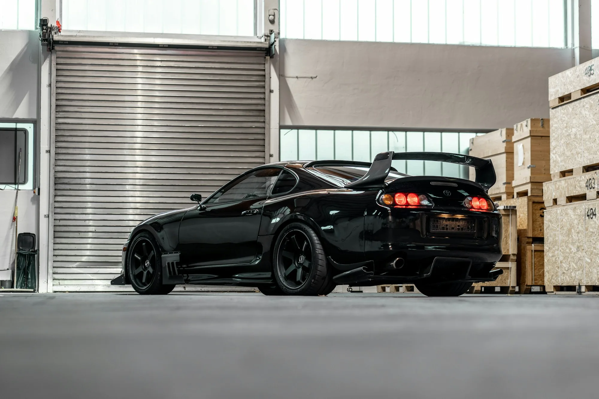 Black car being detailed in a Durham garage